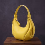 Halbmondförmige Hobo-Schultertasche mit verstellbarem Riemen