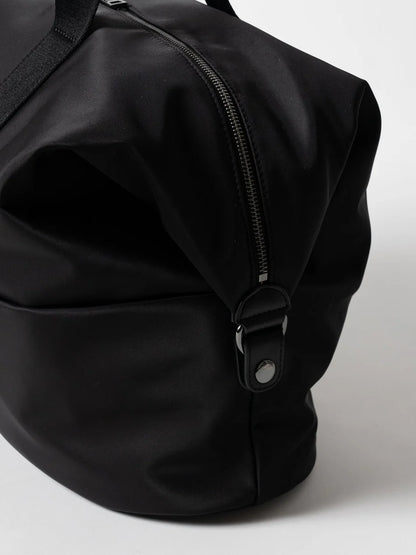 Vielseitige Weekender Tasche aus wasserfestem Nylon mit Gepäckgurt